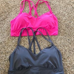 2- all in motion sports bras size L grey and pink
